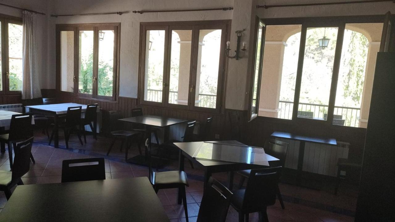 Hostal Restaurante Andra Rio Madera Bagian luar foto