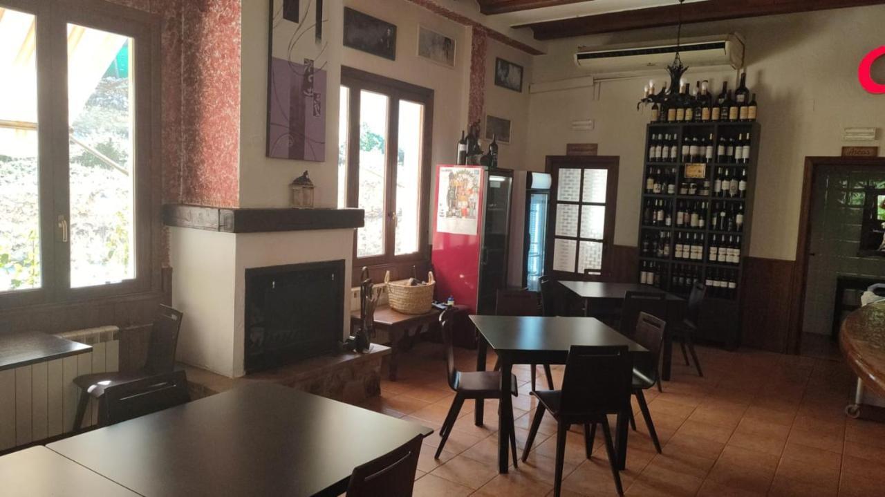 Hostal Restaurante Andra Rio Madera Bagian luar foto
