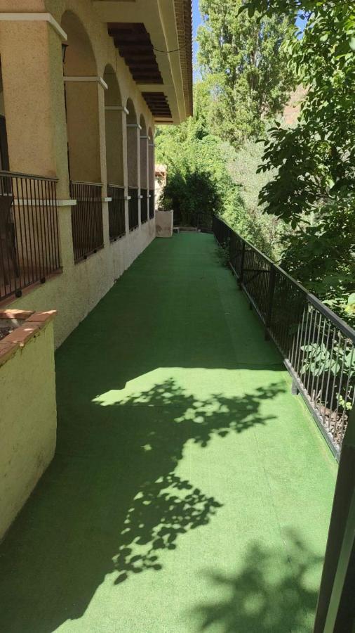 Hostal Restaurante Andra Rio Madera Bagian luar foto
